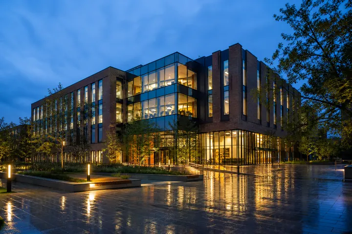The business school building at dusk